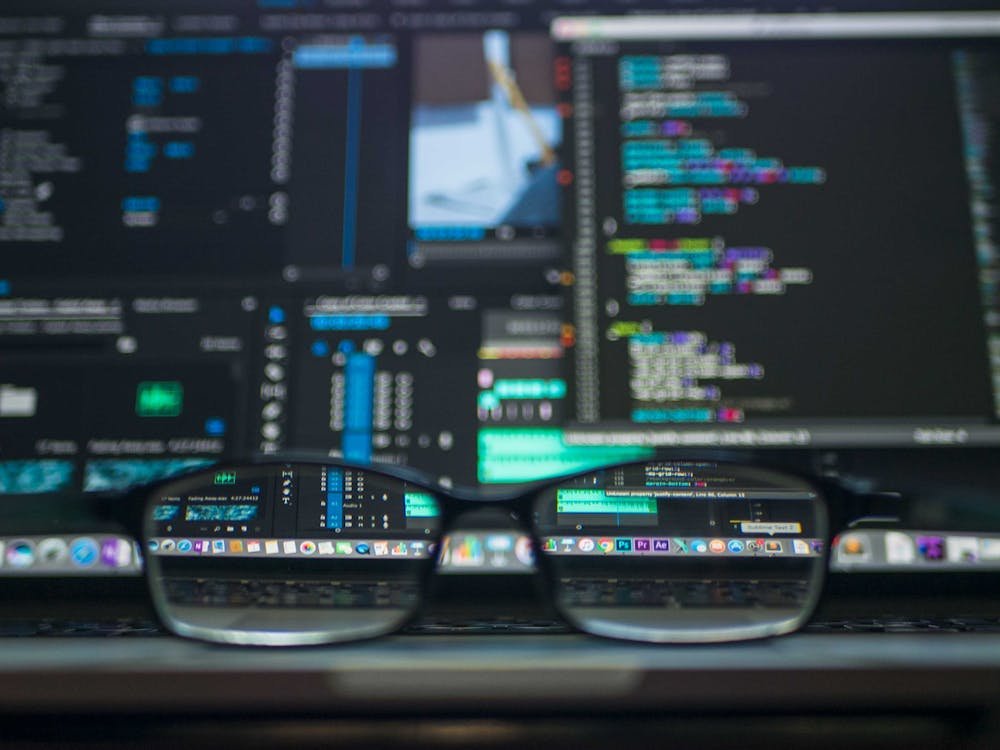 Laptop displaying code editor — connecting Claude Desktop to WordPress using the WordPress MCP plugin by Automattic